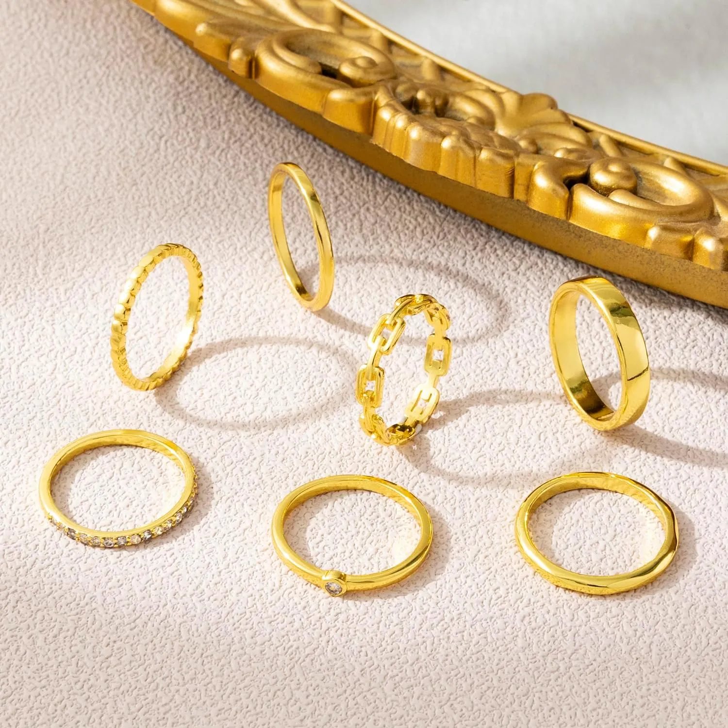 Chinovi 7Pcs Stackable Gold Rings for Women Non Tarnish Trendy Dainty 18K Gold Plated Stacking Cubic Zirconia Ring Set Pack Statement Band Rings Size 5-10